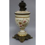 A Royal Worcester floral painted blush ground oil lamp height 42cm