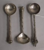 A suite of three early 20th century continental silver spoons with decorated stems and coronet