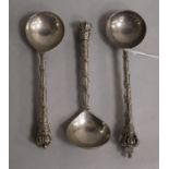 A suite of three early 20th century continental silver spoons with decorated stems and coronet