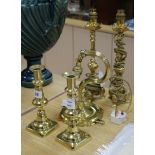 A pair of brass table lamps, another and a pair of candlesticks lamps height 35cm