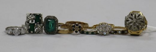 Nine assorted dress rings including four 9ct gold and an Anker ring watch.