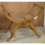 An X frame stool with caned bergere seat W.62cm (a.f.)