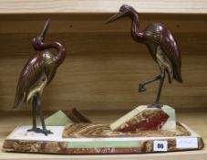 An Art Deco model of storks on a marble base width 46cm height 33cm