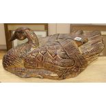 An Oriental lacquered wood duck length 54cm height 20cm