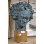 A bronzed plaster busts of Beethoven, signed G. Simon height 52cm