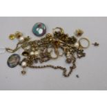 Two chains, 9ct and yellow metal and a quantity of assorted gold ear studs including gem set and