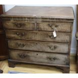 A George III mahogany chest fitted two short drawers and three graduated long drawers, on bracket
