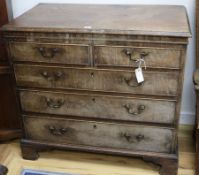 A George III mahogany chest fitted two short drawers and three graduated long drawers, on bracket