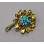 A 1960's 18ct gold, turquoise and diamond set flower brooch, 41mm.