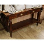 An oak dresser base, fitted two small drawers W.140cm