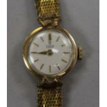 A lady's gold plated Tudor manual wind wrist watch.