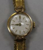 A lady's gold plated Tudor manual wind wrist watch.