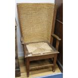 An Orkney Islands oak chair, with woven back W.63cm