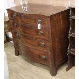 A George III inlaid mahogany serpentine chest fitted four graduated long drawers W.115cm