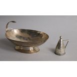 A George V Arts & Crafts planished silver single handled sweetmeat dish, Charles Boyton, London,