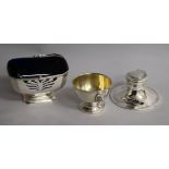 A late 1960's silver sugar basket with liner, a silver capstan inkwell and a small silver bowl