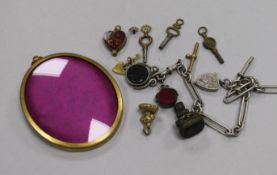 Mixed bijouterie including a silver albert, watch keys, fobs etc.