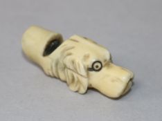 A Victorian ivory dog's head whistle, 4.5cm