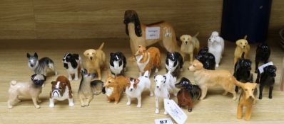 A collection of Beswick figures of dogs