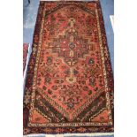 A Hamadan carpet 185cm. x 92cm.