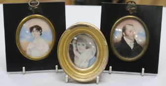 A group of three oval miniature portraits, two by E. Taylor (fl. 1802-1830), one of a lady, signed