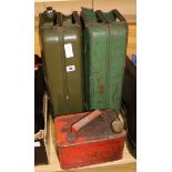 Three vintage petrol cans