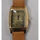 A gentleman's 1930's yellow metal manual wind wrist watch, Winegartens Ltd, in Winegartens box, on
