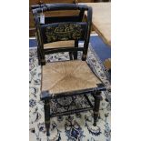 A set of three 19th century American ebonised chairs