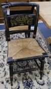 A set of three 19th century American ebonised chairs