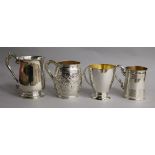 A Victorian silver christening mug, John Evans II, London, 1843 and three other later christening