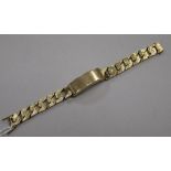 A heavy 1970's textured 9ct gold identity bracelet, 20.2cm.