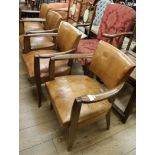 Four French leather Deco style chairs