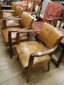 Four French leather Deco style chairs