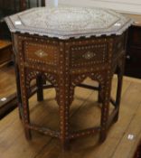 An ivory and ebony inlaid octagonal table, Indian, early 20th century W.61cm
