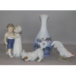 Three Royal Copenhagen porcelain figures and a vase tallest 21cm