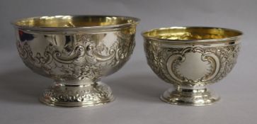 A late Victorian repousse silver rose bowl, Sheffield, 1895 and a similar smaller silver bowl, 9.9