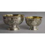 A late Victorian repousse silver rose bowl, Sheffield, 1895 and a similar smaller silver bowl, 9.9