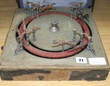 A spinning horse racing game width 33cm depth 33cm