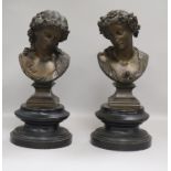 A pair of bronze busts height 31cm