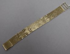 A 1960's 9ct gold brick link bracelet, approx. 18cm.