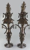 A pair of Yoruba tall bronze Ogboni Secret Society figures, height 80cmProvenance: Ex. Collection of