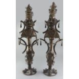 A pair of Yoruba tall bronze Ogboni Secret Society figures, height 80cmProvenance: Ex. Collection of