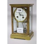 A French brass four glass mantel clock width 14cm height 21cm
