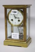 A French brass four glass mantel clock width 14cm height 21cm