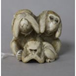 An ivory okimono monkey group