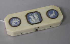 A George III ivory toothpick case, the cover inset with three gold framed Wedgwood jasper plaques,