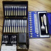 A cased set of silver spoons, silver compact, silver penknife, two other cased silver sets and three