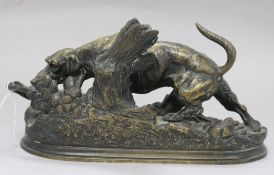 A bronze of a dog, signed