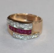 A 1950's yellow metal, ruby and diamond set cocktail ring, size Q.
