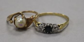 An early 20th century sapphire and diamond three stone ring and a 14ct gold and cultured pearl